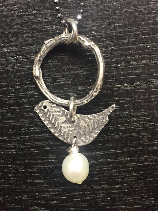 Roots and Wings Rocky Neck Designs